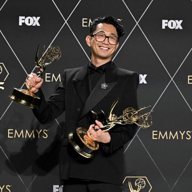 Lee Sung Jin poses in the press room with the Emmys for outstanding directing for a limited or anthology series or movie for "BEEF" episode "Figures Of Light"